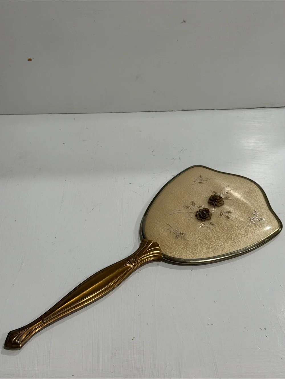 Mid Century Hollywood Regency Hand Held Mirror with Floral Detail 1950’s